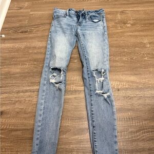 American Eagle Outfitters Light Blue Distressed Skinny Jeans